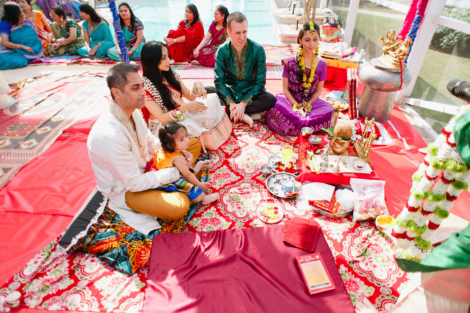 the pithi ceremony during this hindu wedding at the hammock beach resort in palm coast florida where Destination Wedding Photographer Lexia Frank - one of the best indian wedding photographers - photographs this luxury indian wedding on film because she is a film photographer for indian weddings using medium format film cameras still today