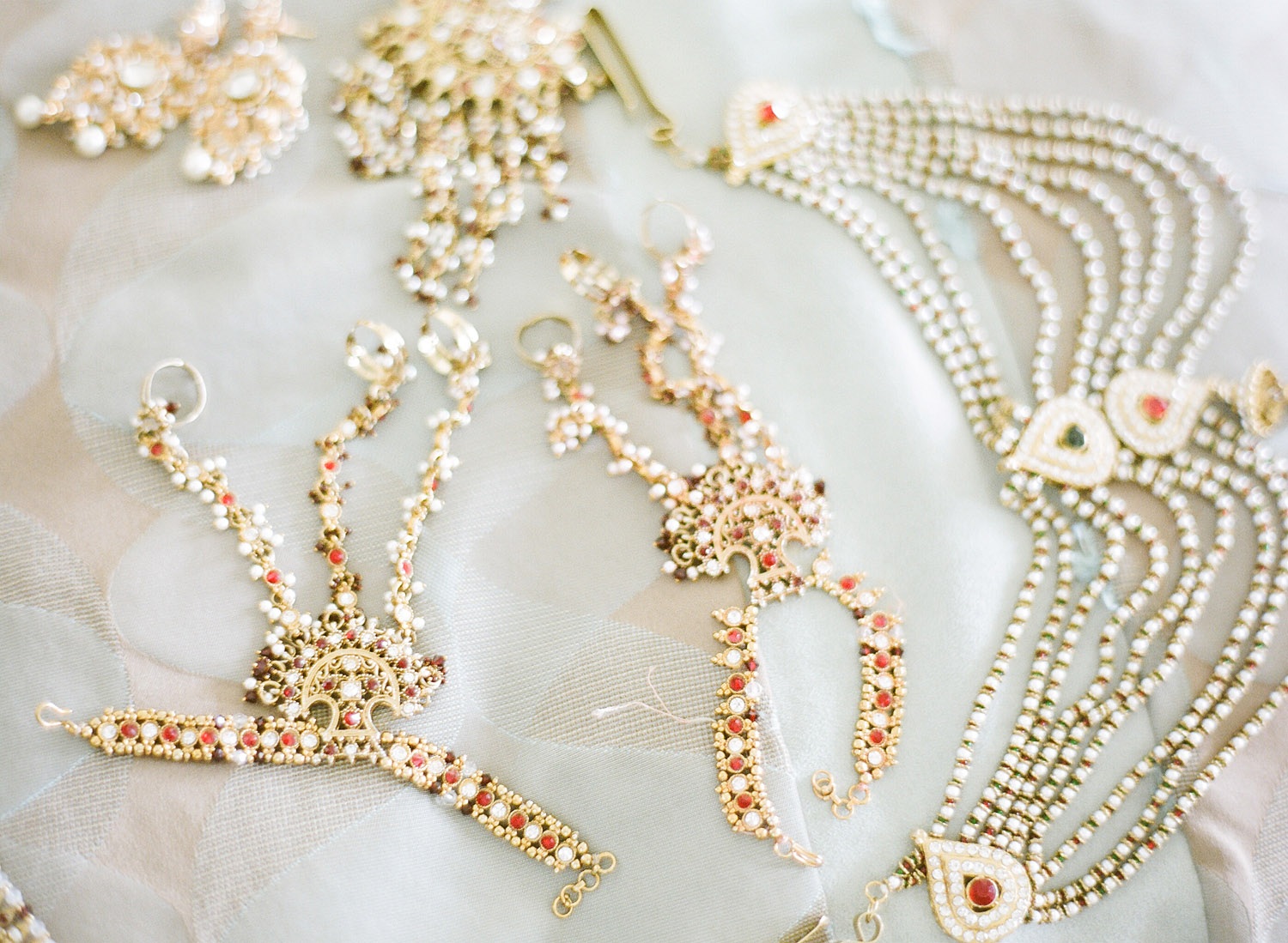 traditional indian wedding jewelry for this hindu wedding at vizcaya miami where Destination wedding photographer Lexia Frank, rated top indian wedding photographer for luxury indian weddings, photographs this luxury indian wedding on film because she prefers the tonality and vibrant colors of film for indian weddings in india and worldwide. manish malhotra and suneet varna 