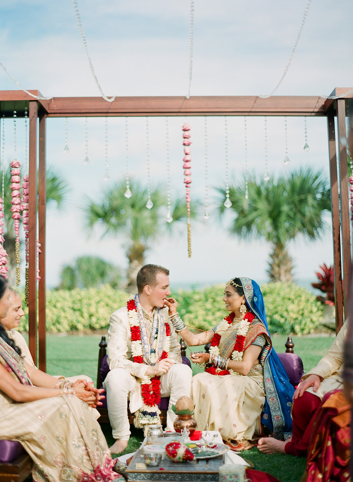bride and groom at the hindu wedding in florida at the Indian Wedding in Florida photographed by Destination Wedding Photographer, LExia Frank - a top indian wedding photographer - who shoots film for luxury indian weddings preferring the soft skin tones and vibrant colors for indian weddings in india and worldwide