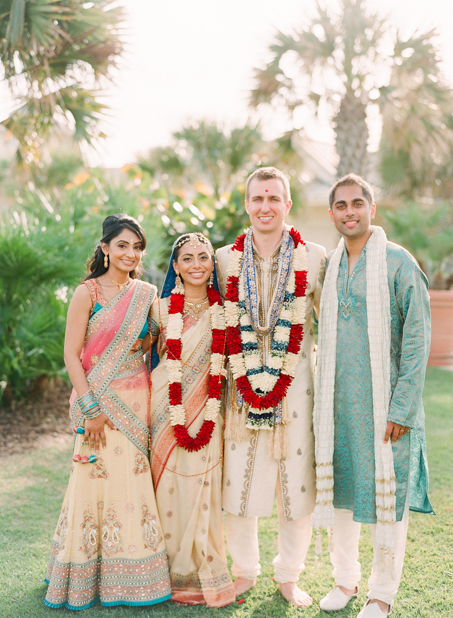 family formal photos after this Indian Wedding in Florida photographed by Destination Wedding Photographer, LExia Frank - a top indian wedding photographer - who shoots film for luxury indian weddings preferring the soft skin tones and vibrant colors for indian weddings in india and worldwide