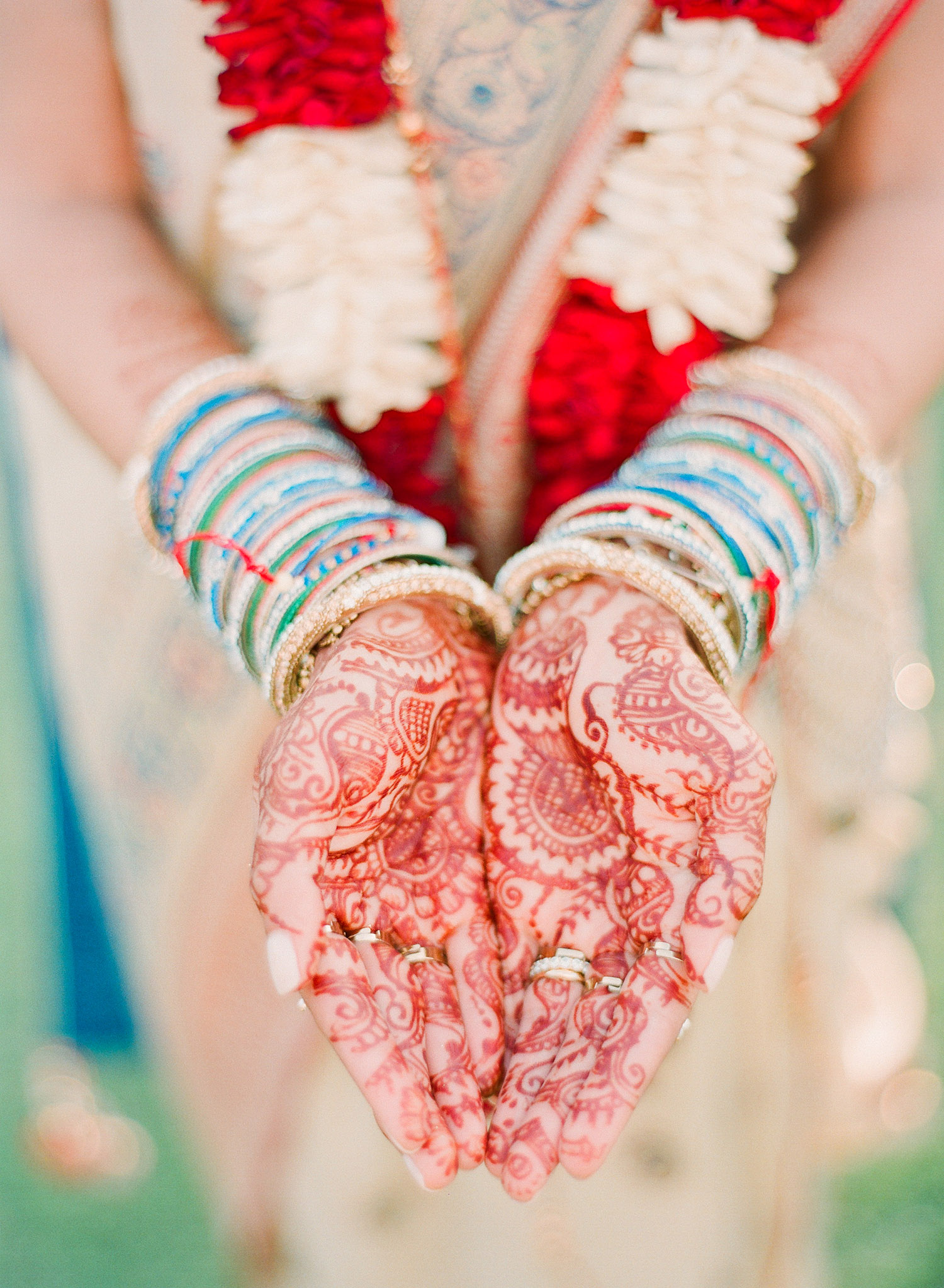 hindu bride's mehndi design made with henna at this Indian Wedding in Florida photographed by Destination Wedding Photographer, LExia Frank - a top indian wedding photographer - who shoots film for luxury indian weddings preferring the soft skin tones and vibrant colors for indian weddings in india and worldwide