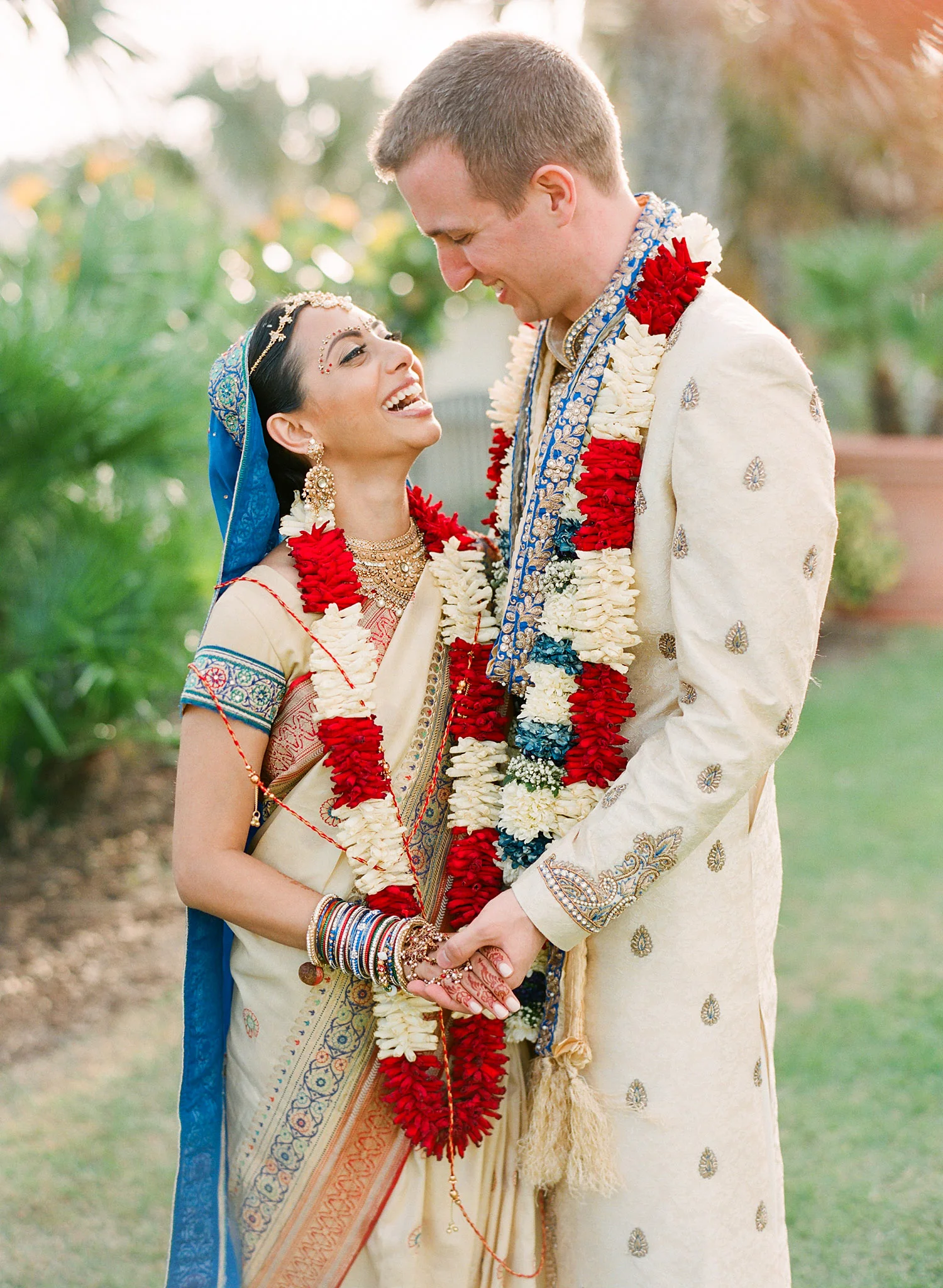 bride and groom after their hindu wedding ceremony at this Indian Wedding in Florida photographed by Destination Wedding Photographer, LExia Frank - a top indian wedding photographer - who shoots film for luxury indian weddings preferring the soft skin tones and vibrant colors for indian weddings in india and worldwide