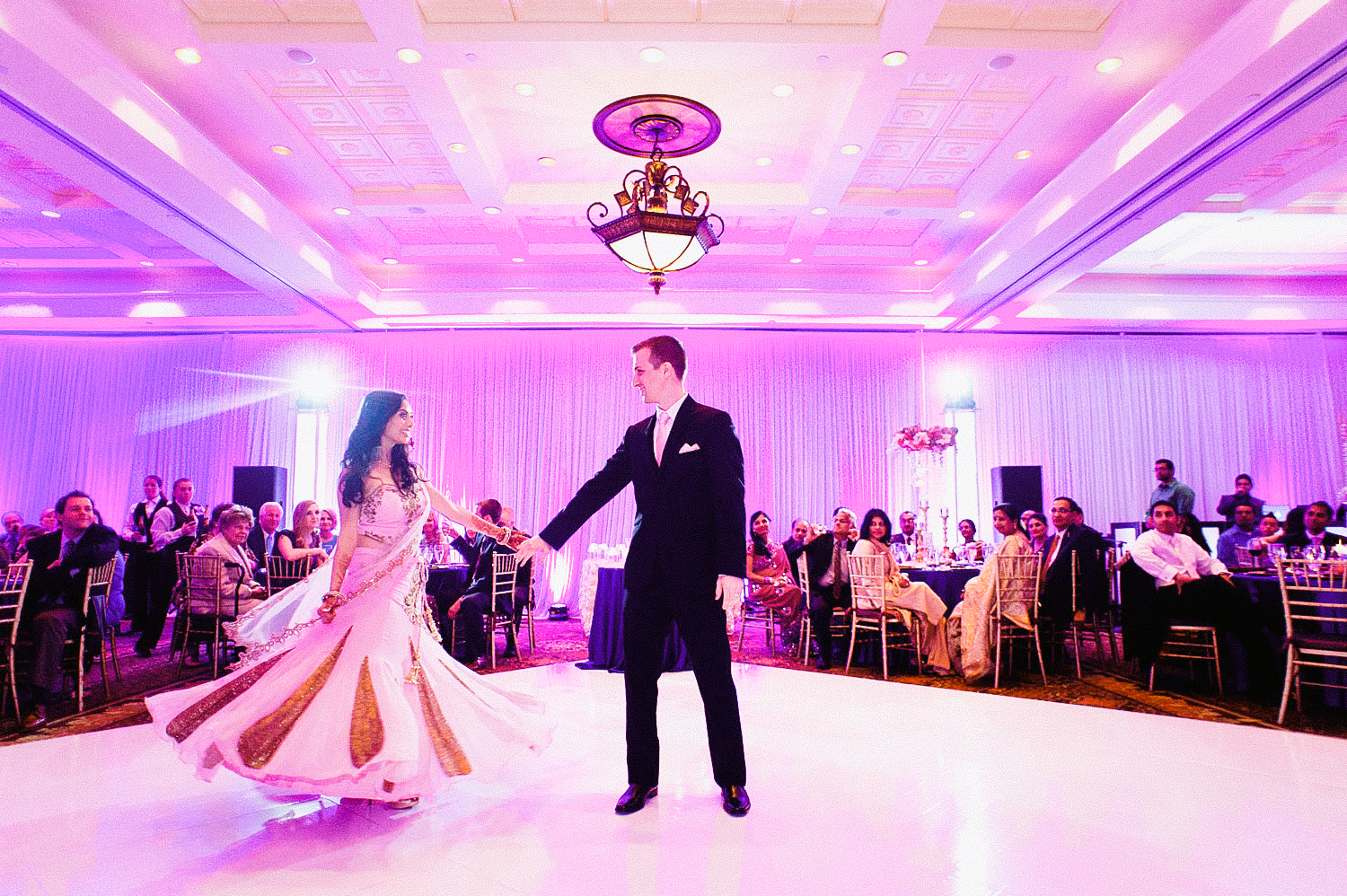 indian bride wears a pink and gold wedding lengha for her indian wedding in florida on the beach in palm coast florida as Destination Wedding Photographer Lexia Frank - an award winning indian wedding photographer - photographs her indian wedding on film, as she is a fine art wedding film photographer for destination weddings and luxury weddings worldwide. vizcaya miami wedding, hammock beach resort wedding