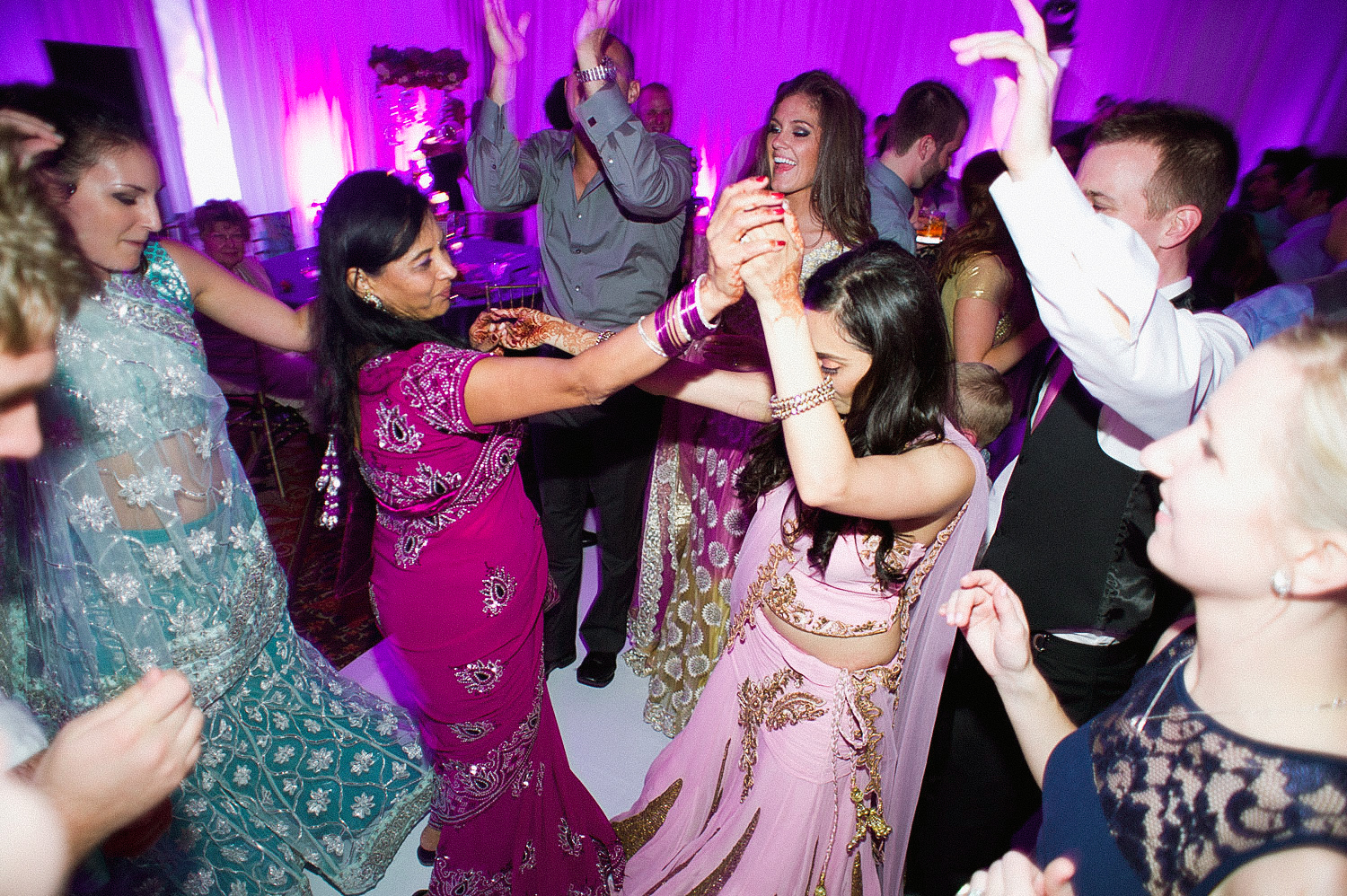 indian bride wears a pink and gold wedding lengha for her indian wedding in florida on the beach in palm coast florida as Destination Wedding Photographer Lexia Frank - an award winning indian wedding photographer - photographs her indian wedding on film, as she is a fine art wedding film photographer for destination weddings and luxury weddings worldwide. vizcaya miami wedding, hammock beach resort wedding