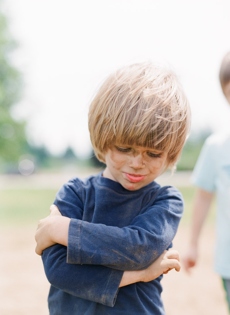 little boy with a dirty face is photographed on film during this lifestyle family session in portland by Portland Oregon Lifestyle Family Photographer - Lexia Frank - a portland oregon film photographer