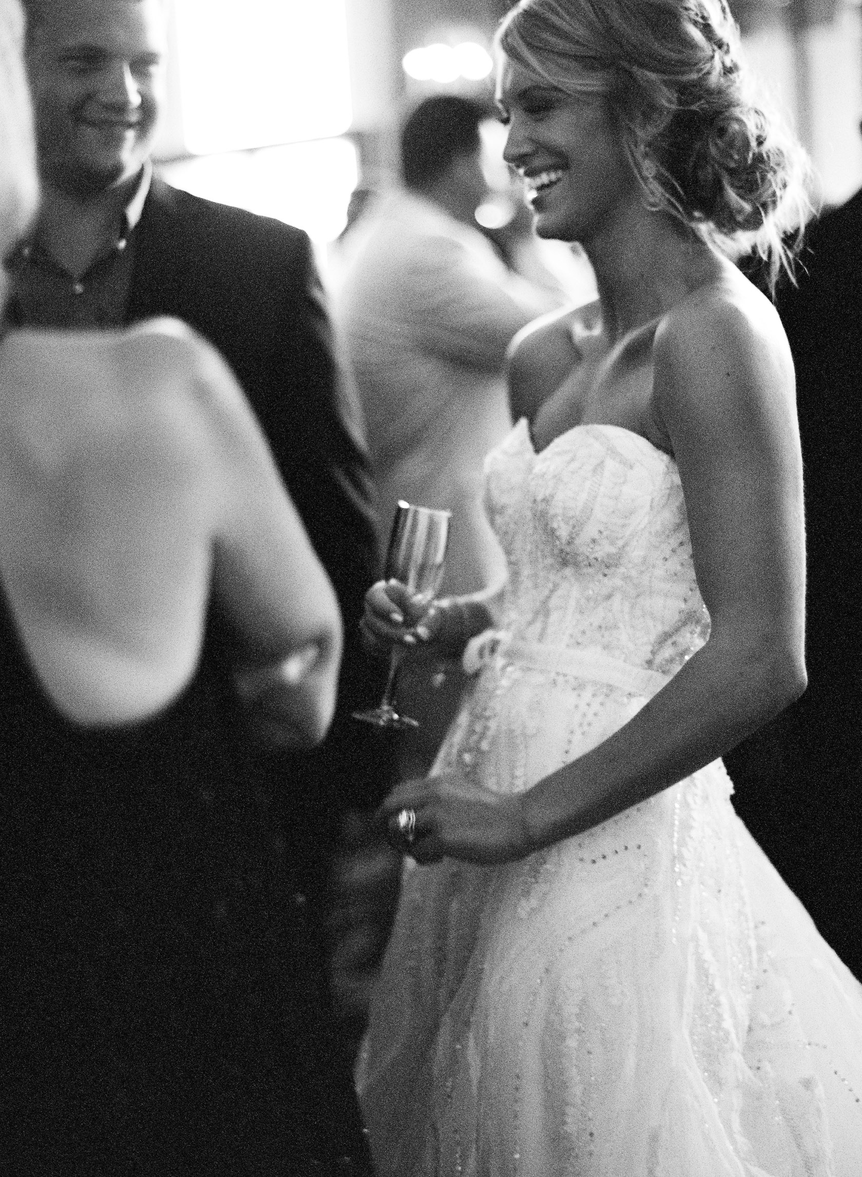 Destination Wedding Photographer, Lexia Frank, photographs this beautiful wedding on film of NFL player Bryan Bulaga and his beautiful wife Abbie at the Hilton Downtown Milwaukee wedding. Lexia Frank is a celebrity wedding photographer on the west coast photographing luxury weddings worldwide