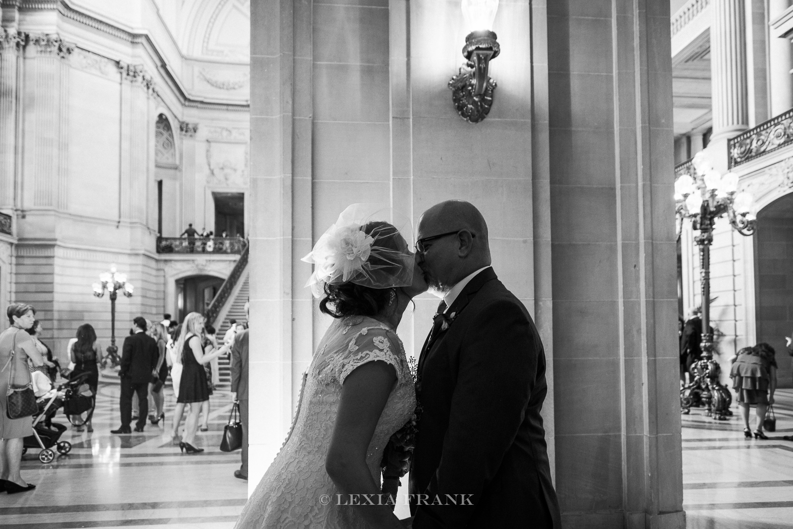 destination wedding photographer Lexia Frank - a portland oregon fine art film photographer - photographs this san francisco city hall wedding as bride and groom see each other the first time. www.lexiafrank.com 
