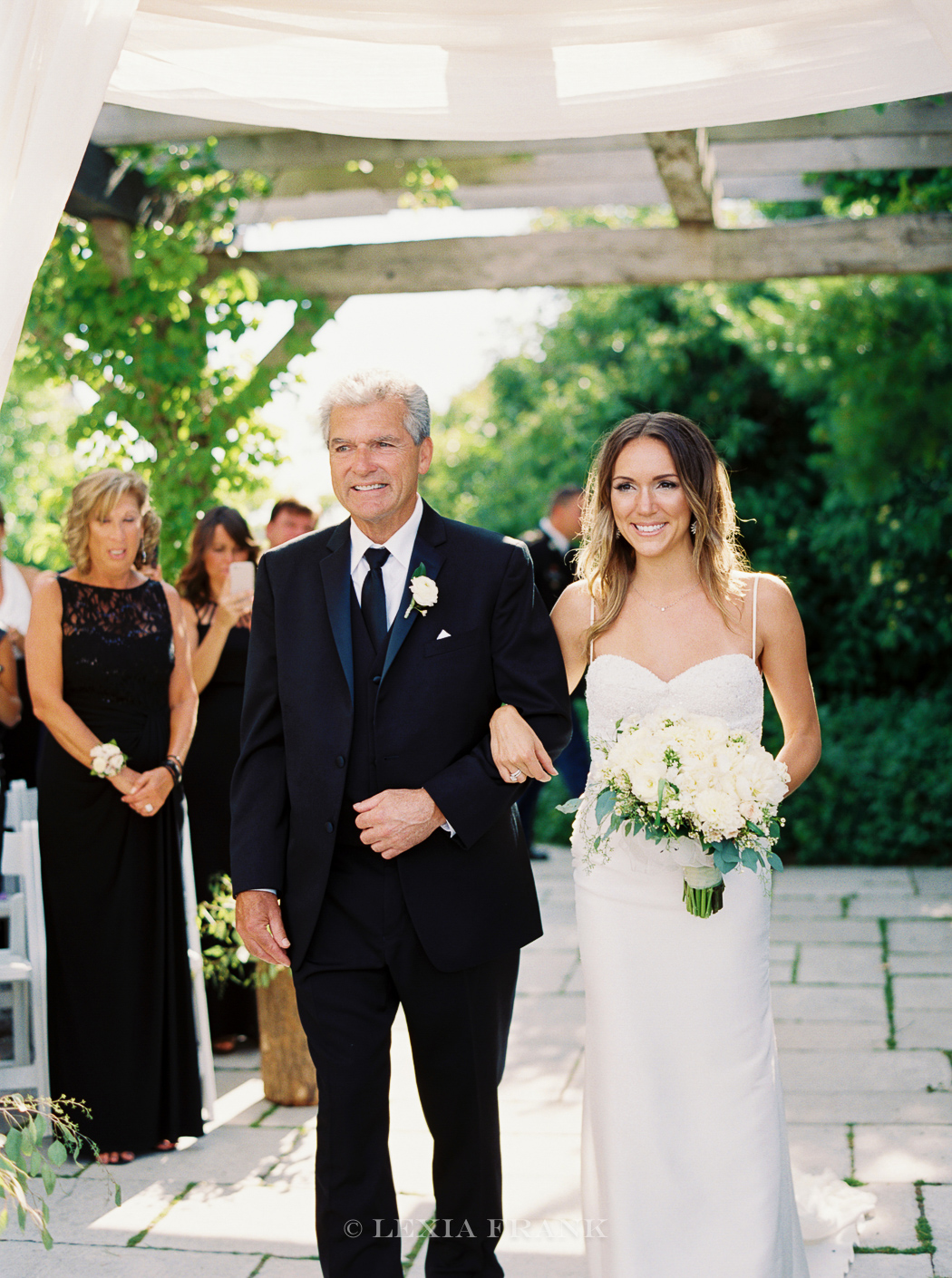 destination wedding photographer Lexia Frank- a portland oregon fine art film photographer- photographs this luxury wedding at whistling straits golf course wedding on film. 