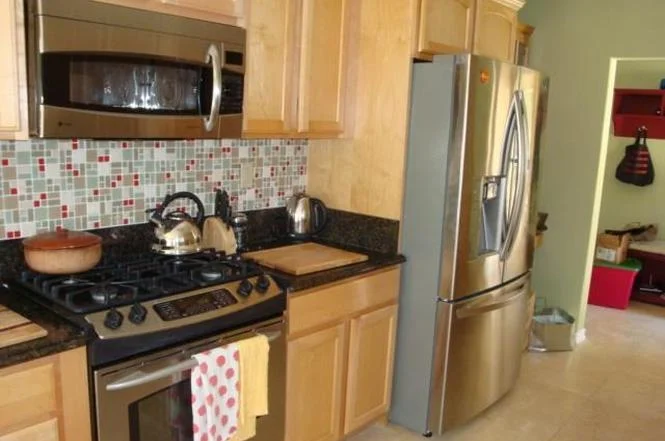 The kitchen before the remodel (photo used with permission of Lucy Nixon Realty Inc)