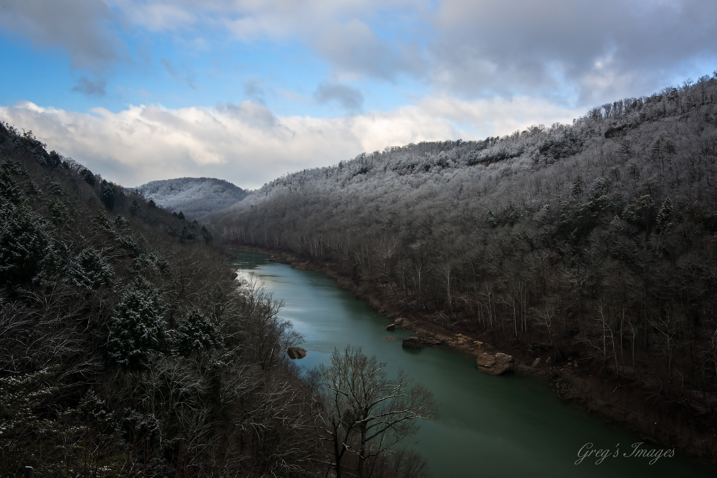 Snow-capped ridges along the South Fork River as seen from Yahoo Overlook.