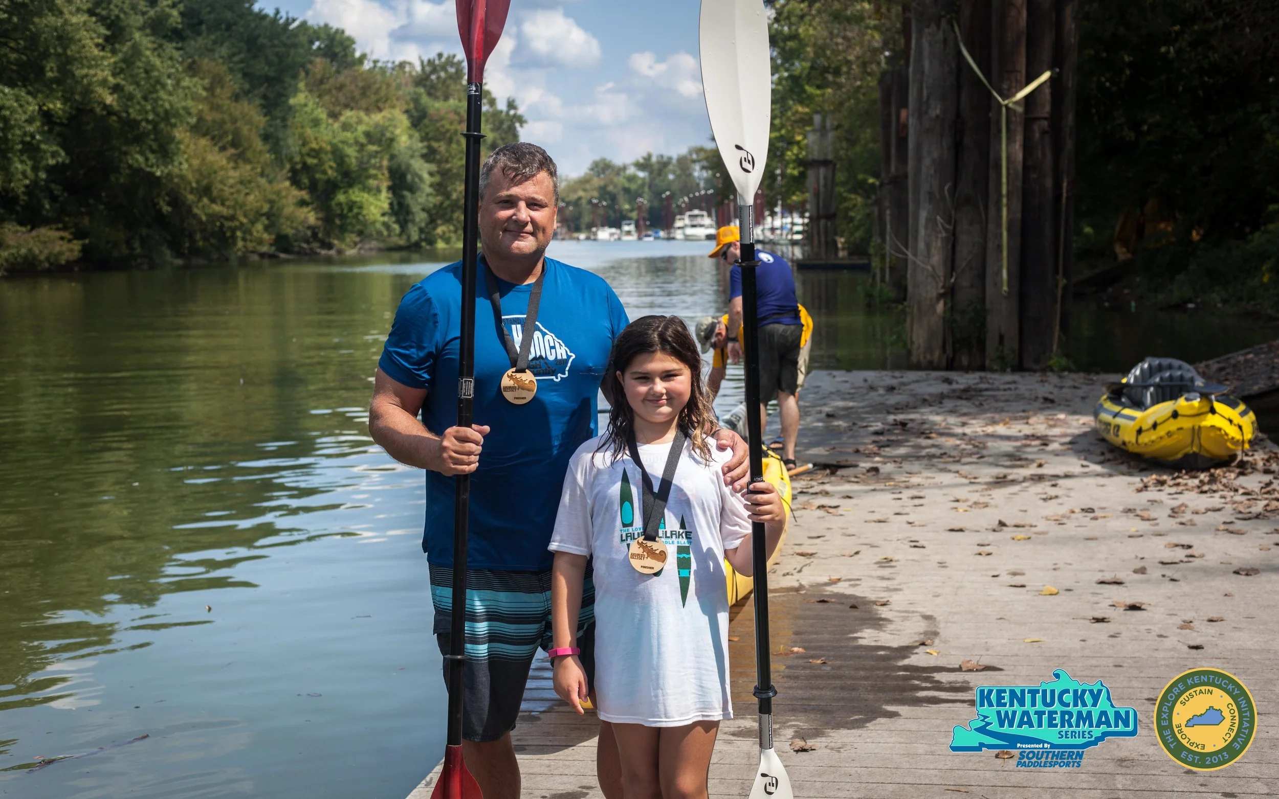 Joe & Emma-Kate Stibler at the finish line of the 7 mile race after finishing 1st place in the tandem kayak division. Photo by Gerry James