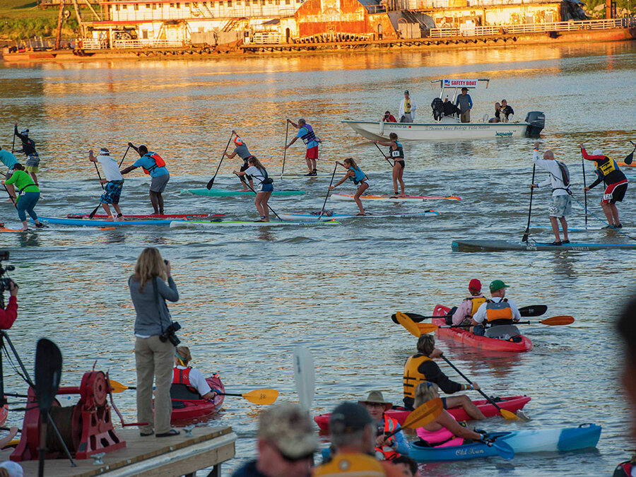  Hundreds of people in canoes and kayaks paddled from Schmidt Recreation Complex to Gilday Riverside Park during the Ohio River Paddlefest on Aug. 5, 2017. The start of the SUP Race.  
