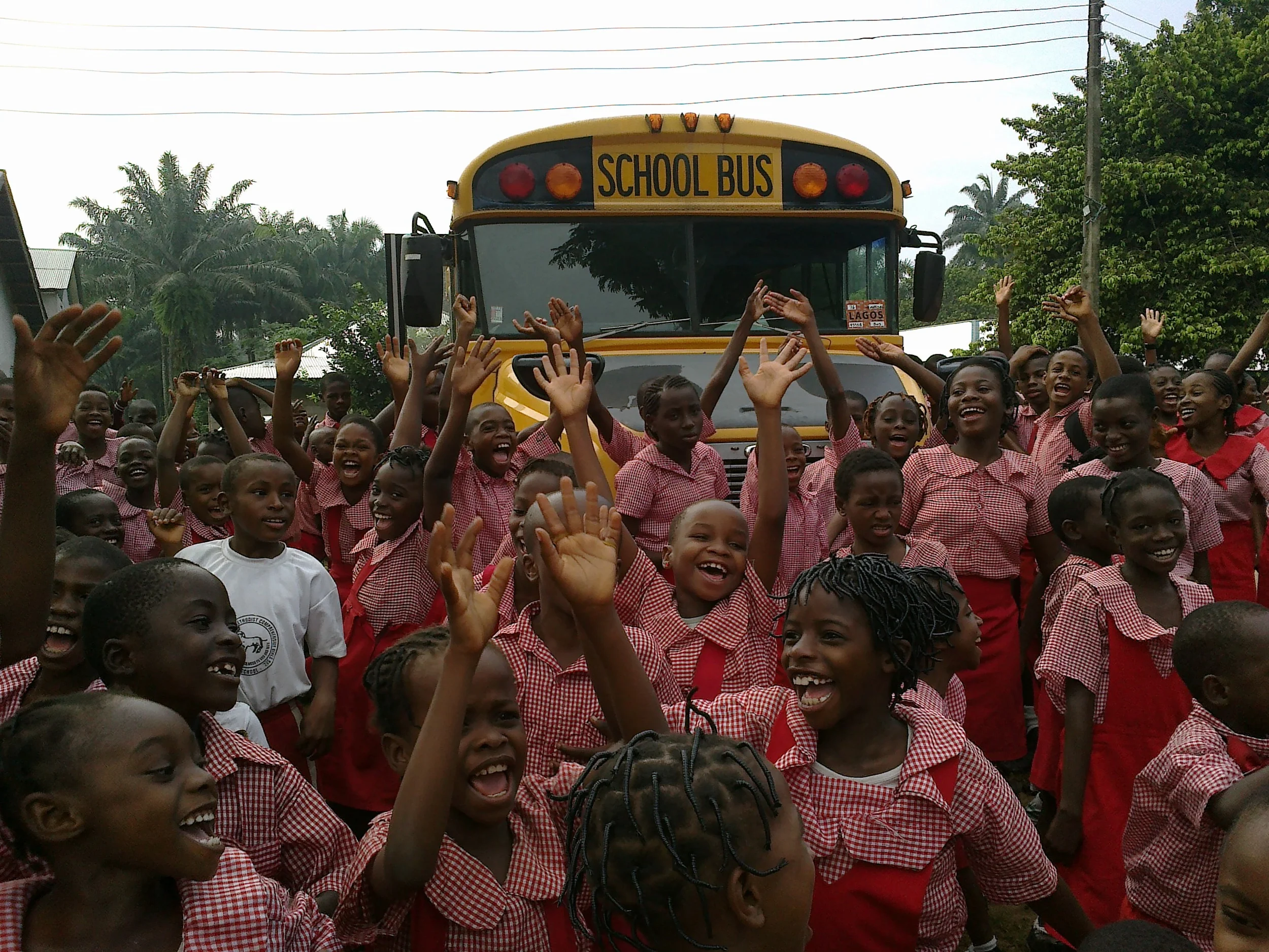 Children with new bus.jpg