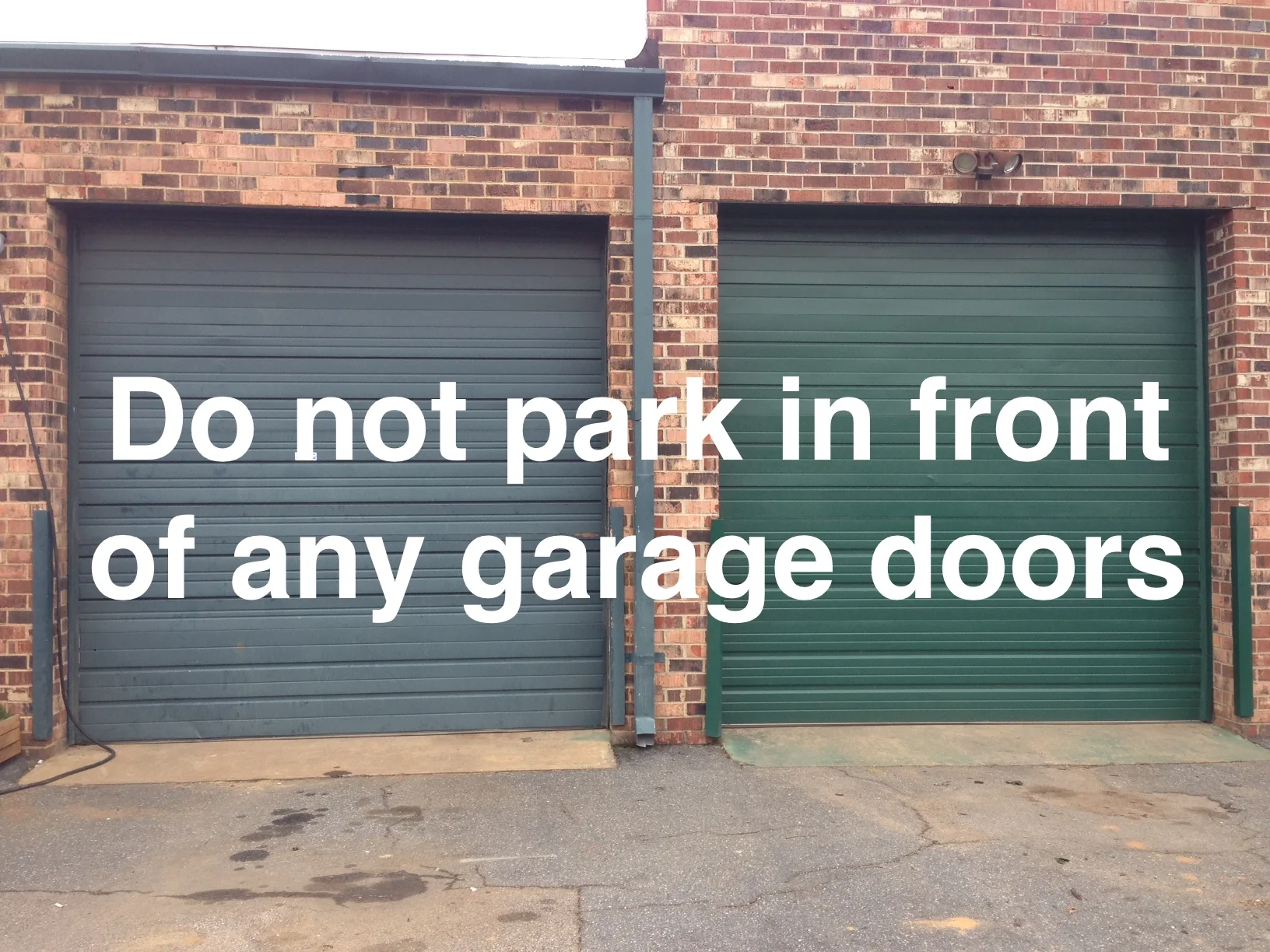 Definitely do not park in front of anything that looks like this. Loading bays are used 24/7 by my neighbors to operate their businesses.
