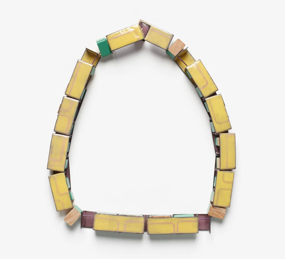 Interlocking Train , front view, 2013. Deconstructed wooden block toy, copper, enamel, thread. Photo by Jeremy Dillon.