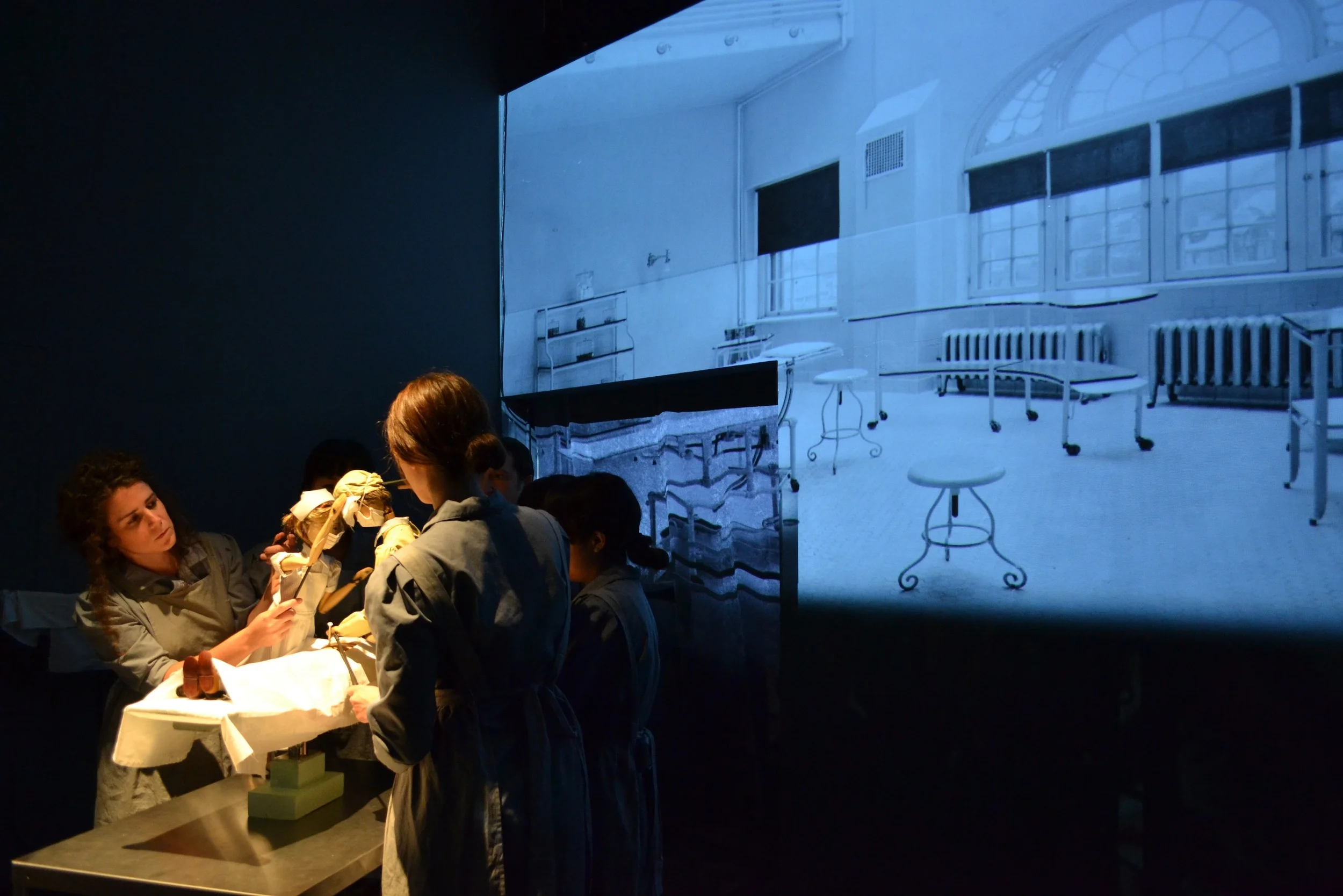 FT surgery nurse wipes face 0601.JPG