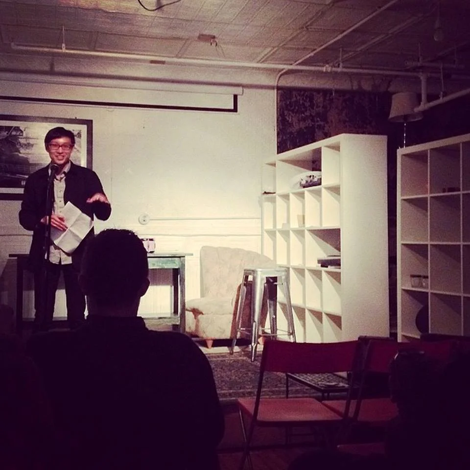A photo of Kevin Nguyen reading at the very first Difficult to Name Reading a year ago. He'll be reading at the April 25 edition at Brit Pack .