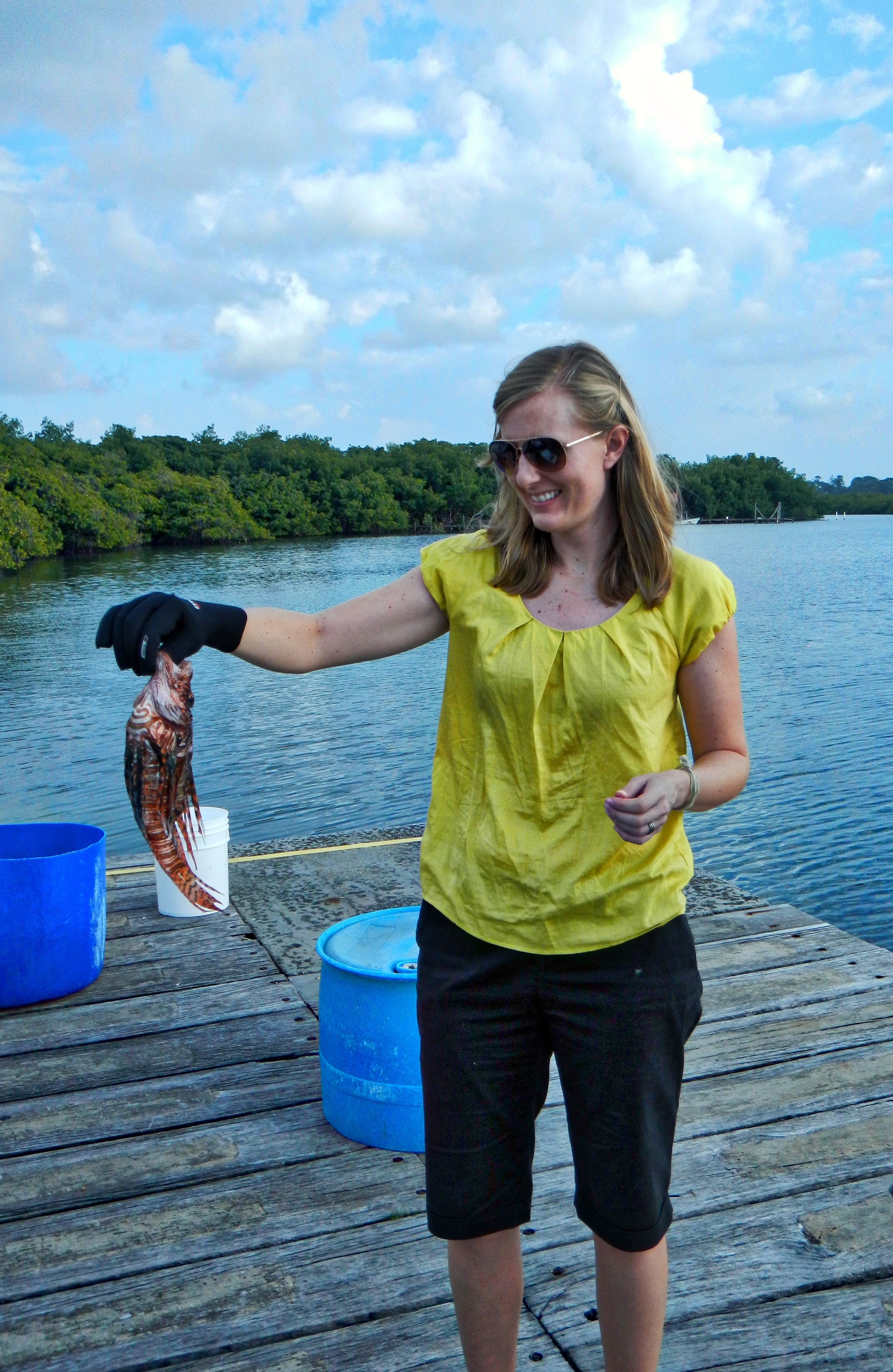 Ashley Freeman holding her first lionfish