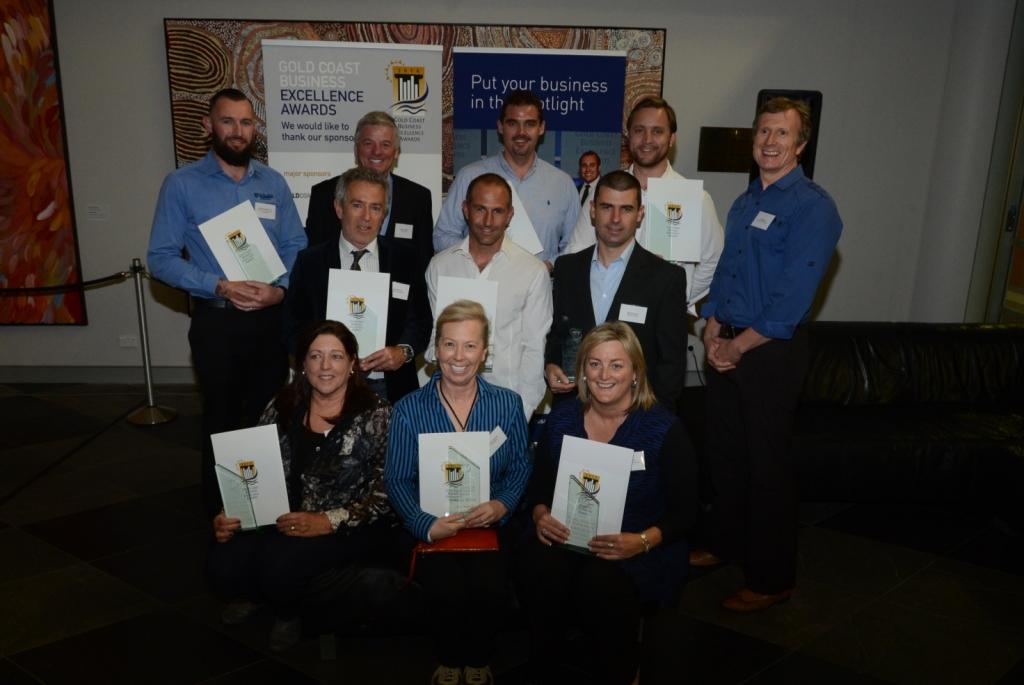 Andy & Janet posing with the other August 2014 Excellence Award winners