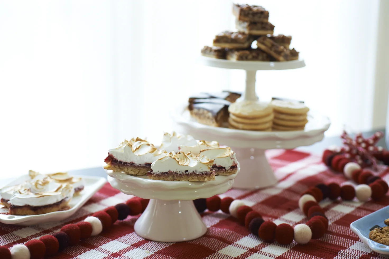 Set up a pretty buffet of cookies and candy plus coffee, hot tea, hot cocoa, and other holiday favorites.