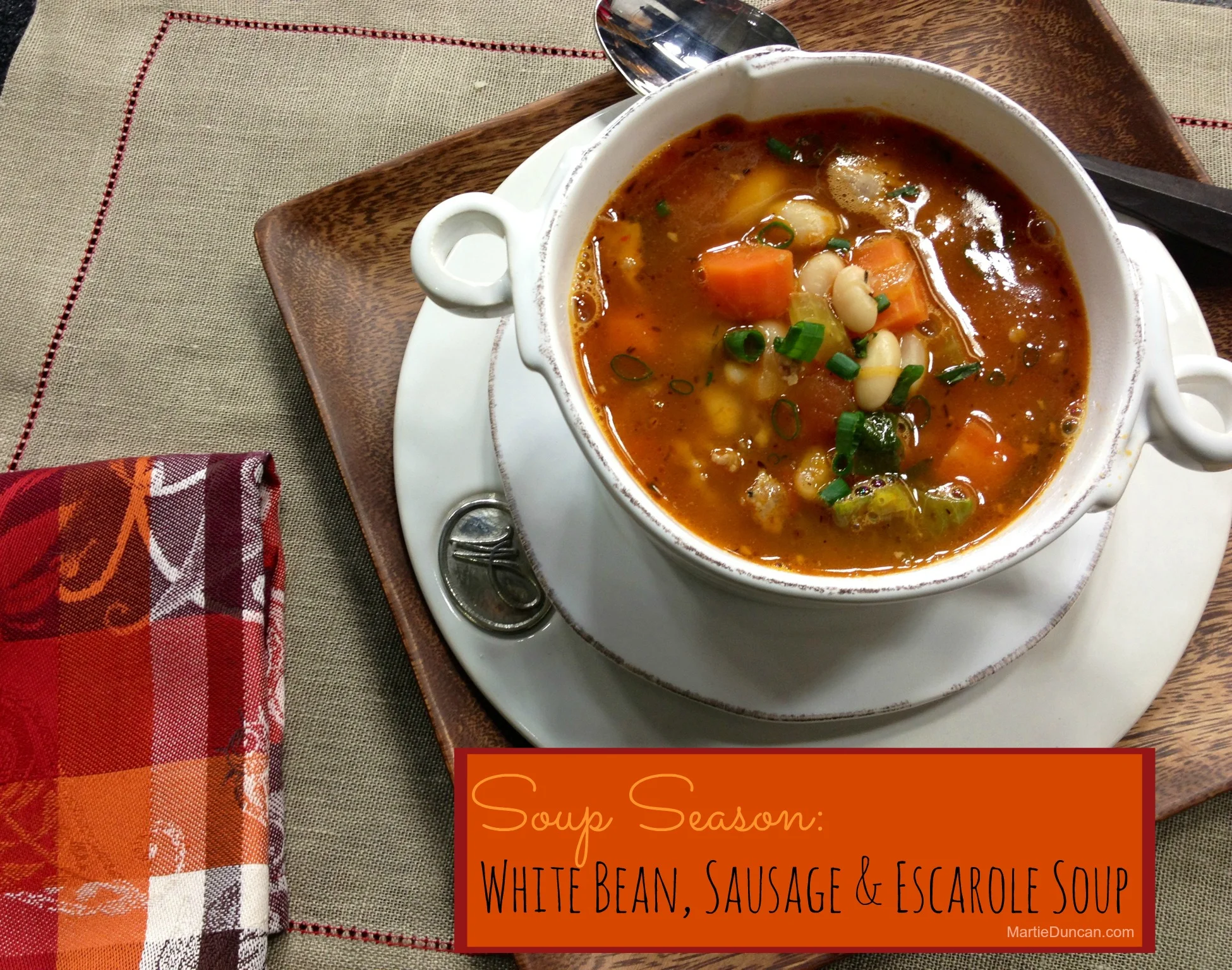 Sausage, White Bean, and Escarole Soup is hearty, easy, and very affordable for a big crowd! Serve with some toasted bread and a salad and you've got dinner!