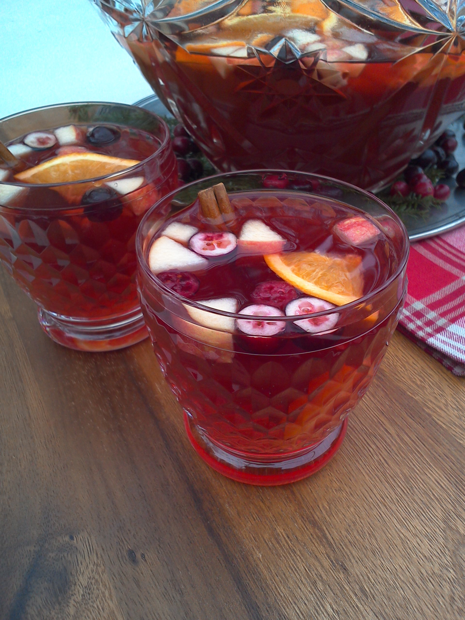 winter sangria with cranberry, apple and cinnamon punch bowl recipe MartieDuncan.com