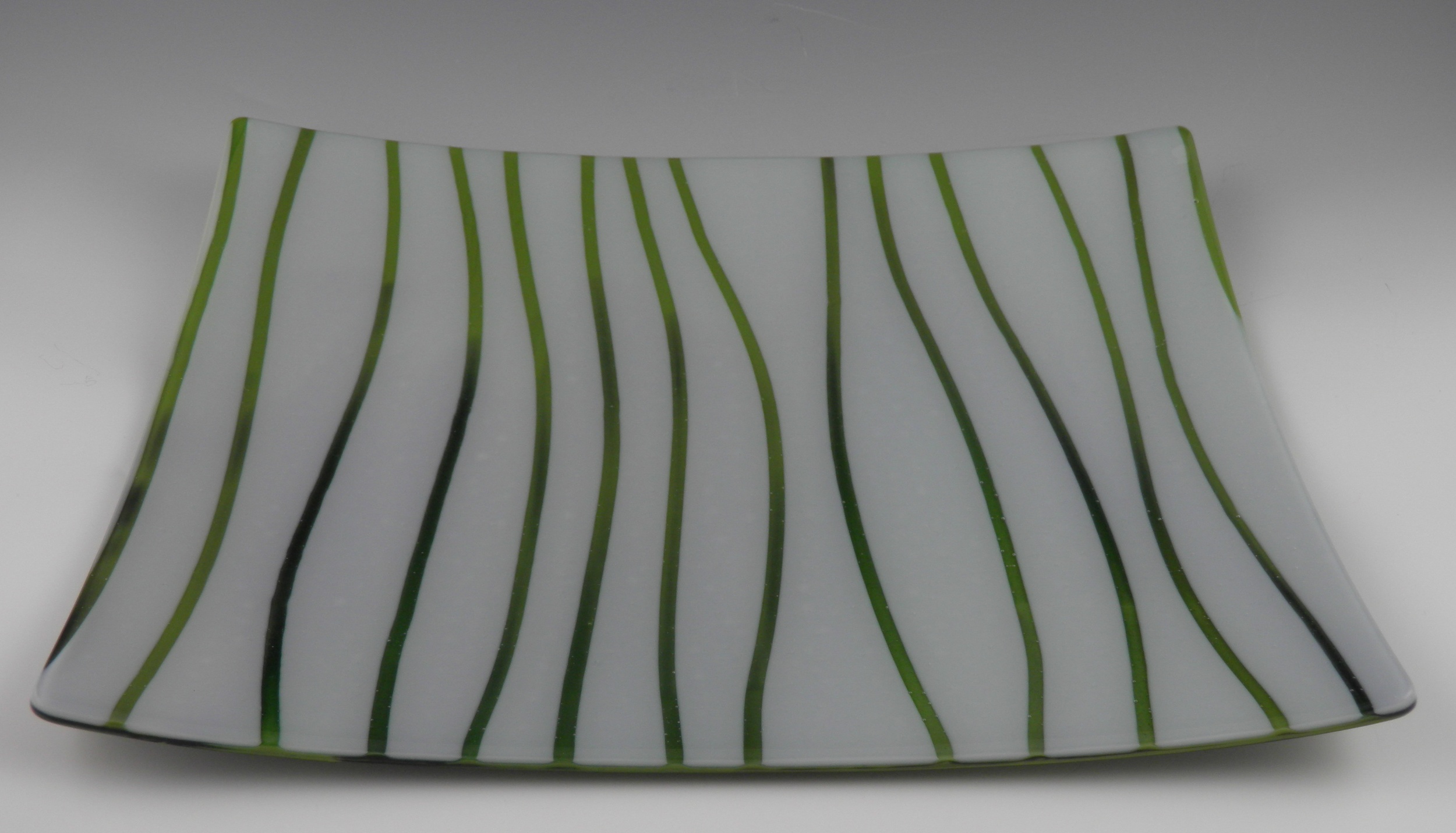 green grass on white platter