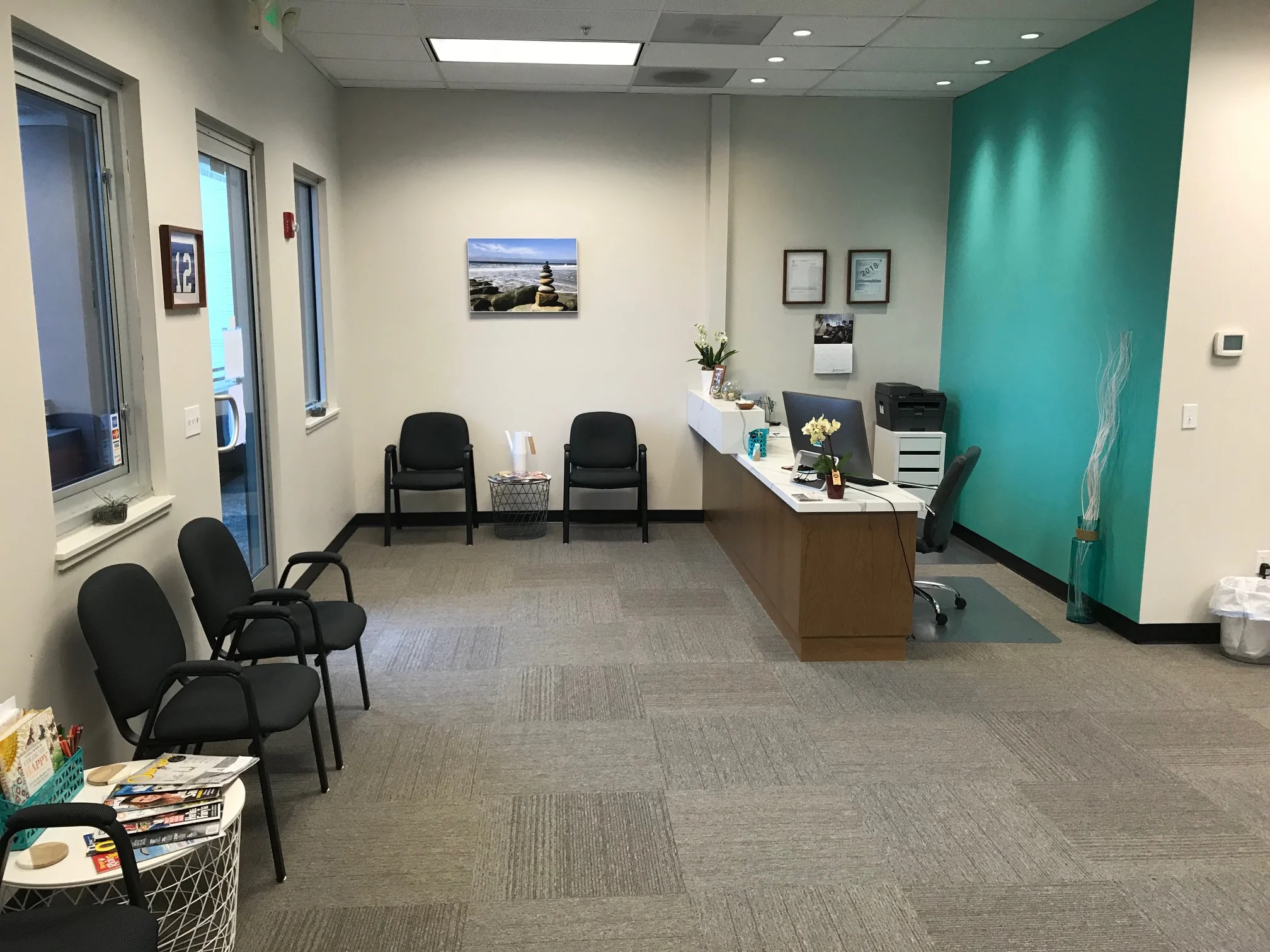 Reception Room- There are 2 separate play areas for kids with books, blocks, toys, and coloring books.