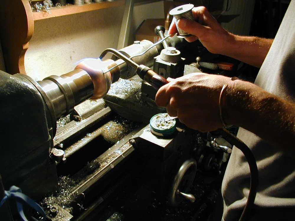 Soldering the two spun copper half spheres together