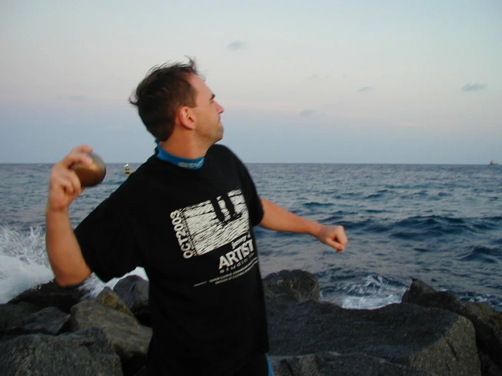 Throwing sphere #11 into the Atlantic ocean from Singer Island, Florida on January 2, 2004