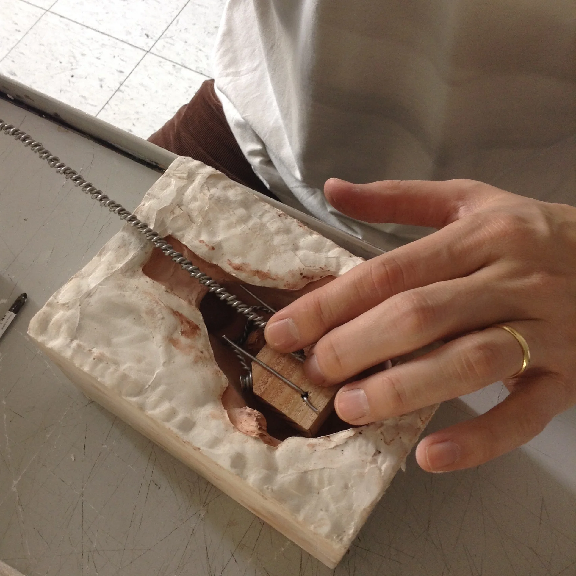 Placing an armature into a mold - Sid's Toys