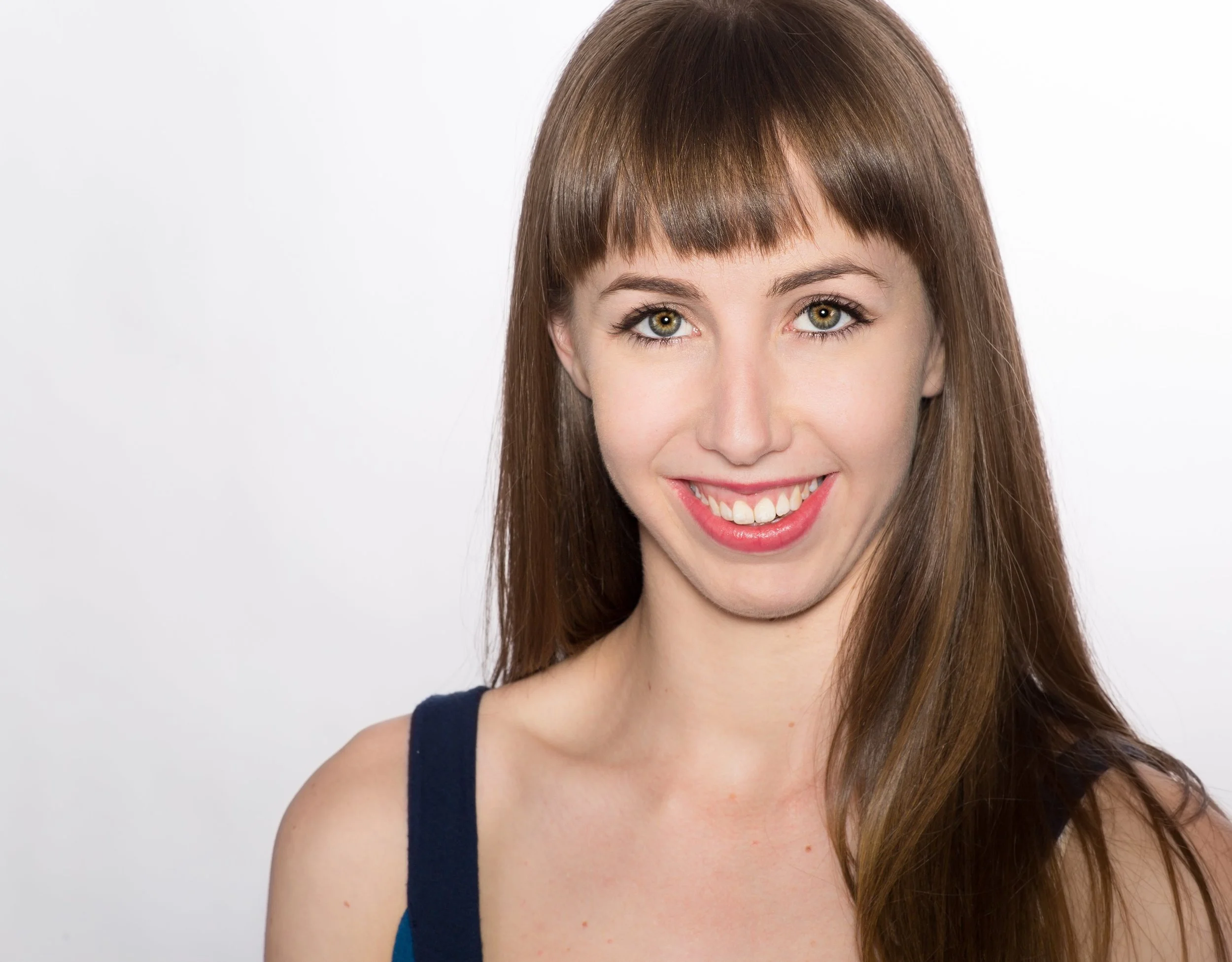 Headshot 3 sized down.jpg