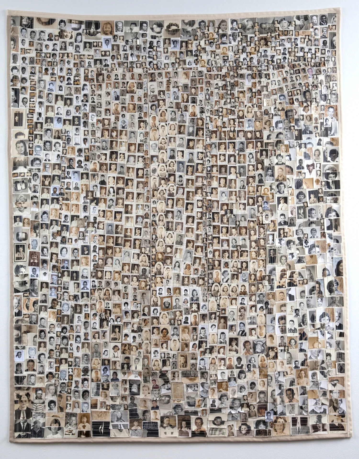 SCHOOL DAYS MEDIUM : Approximately 1,000 Found Photographs, canvas, thread, pencil, watercolor & ink. SIZE: 54 ” (h) x 43” (w) DATE: 2014