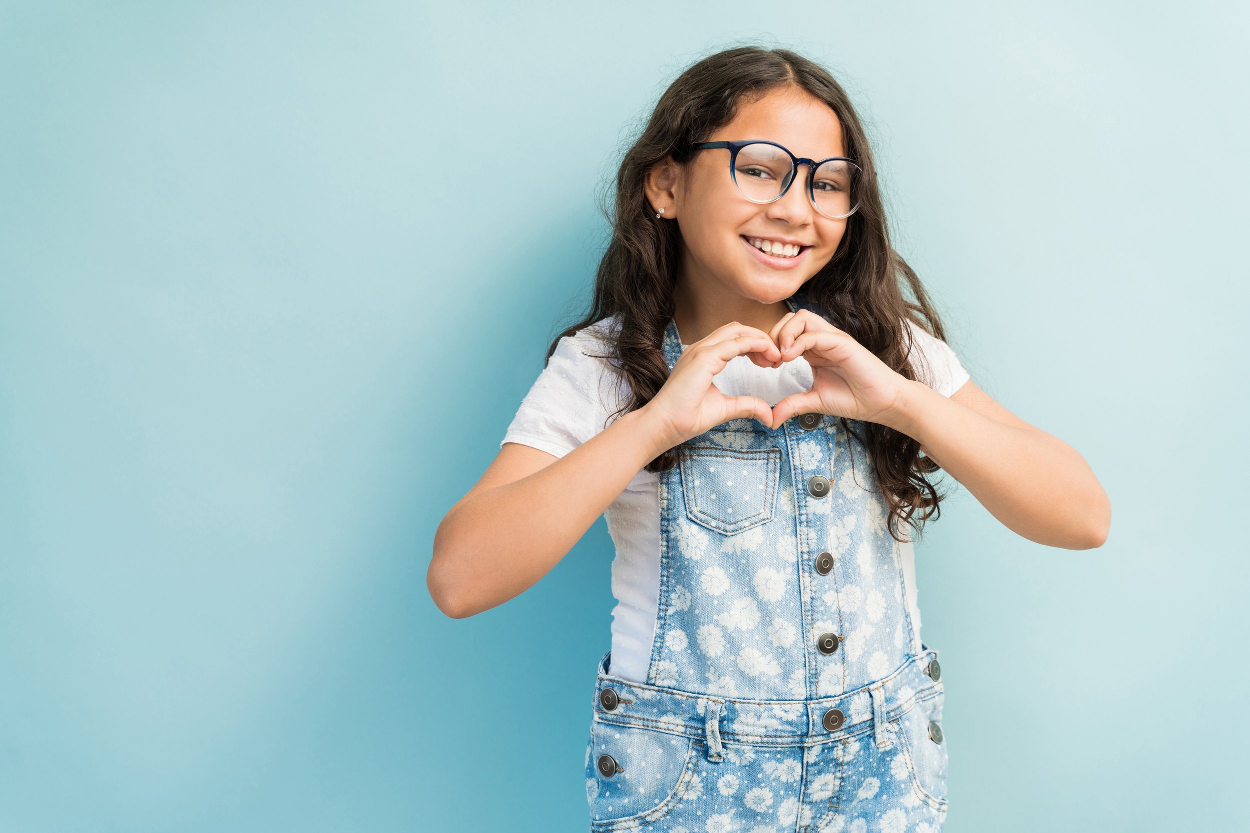 Girl with glasses and heart.jpg