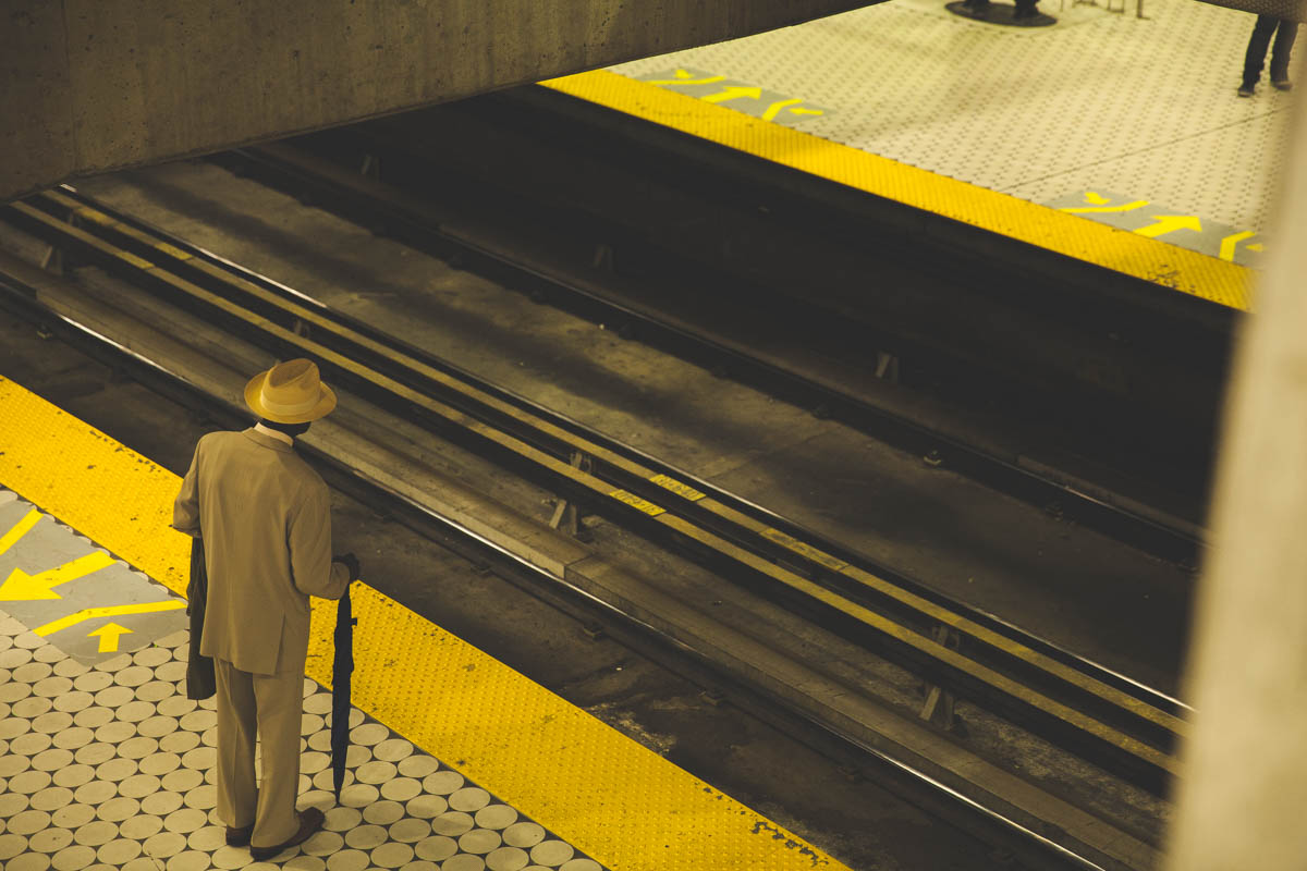 A man waits for the train.
