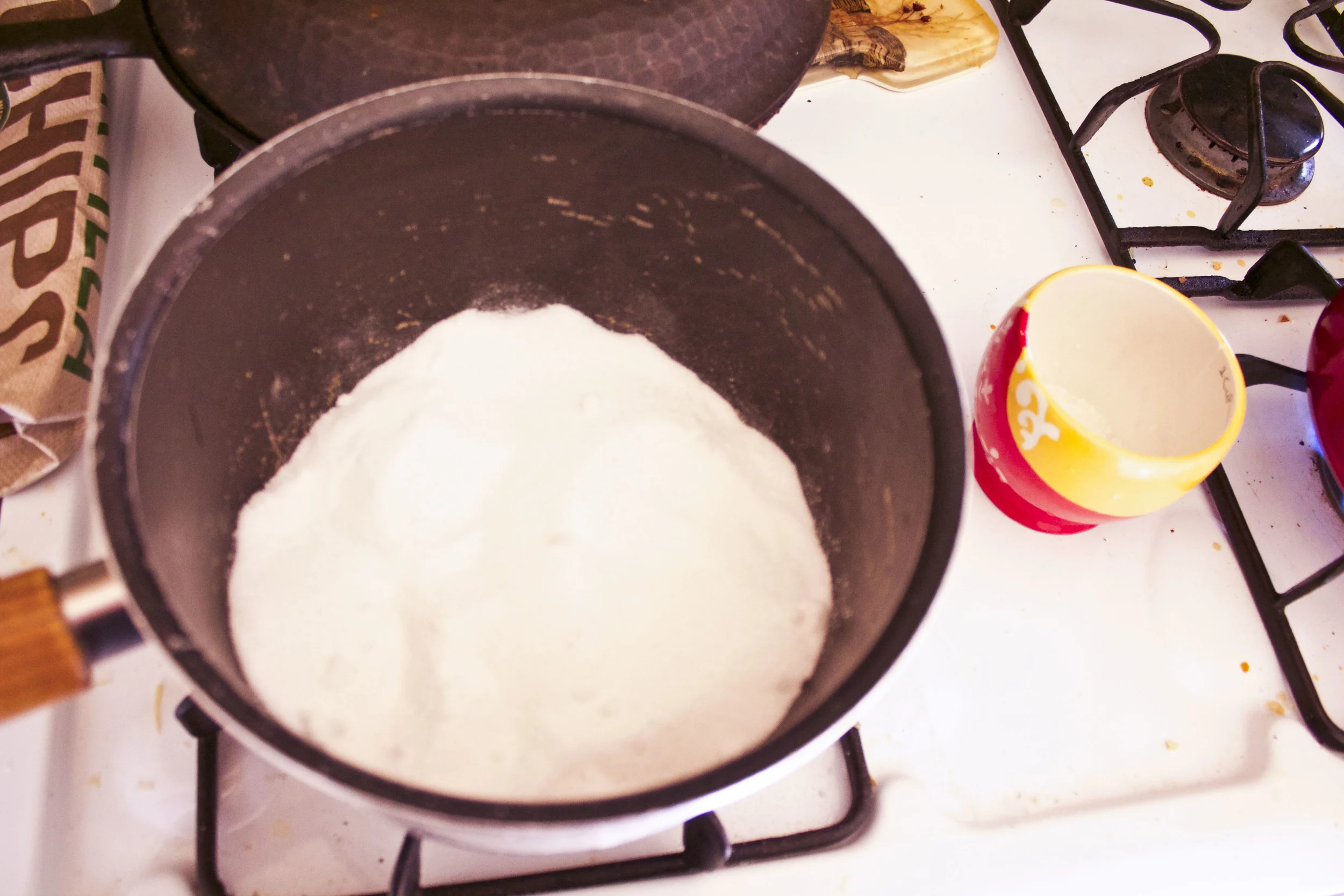 Place one cup of sugar in a pot, The water will soon be added.