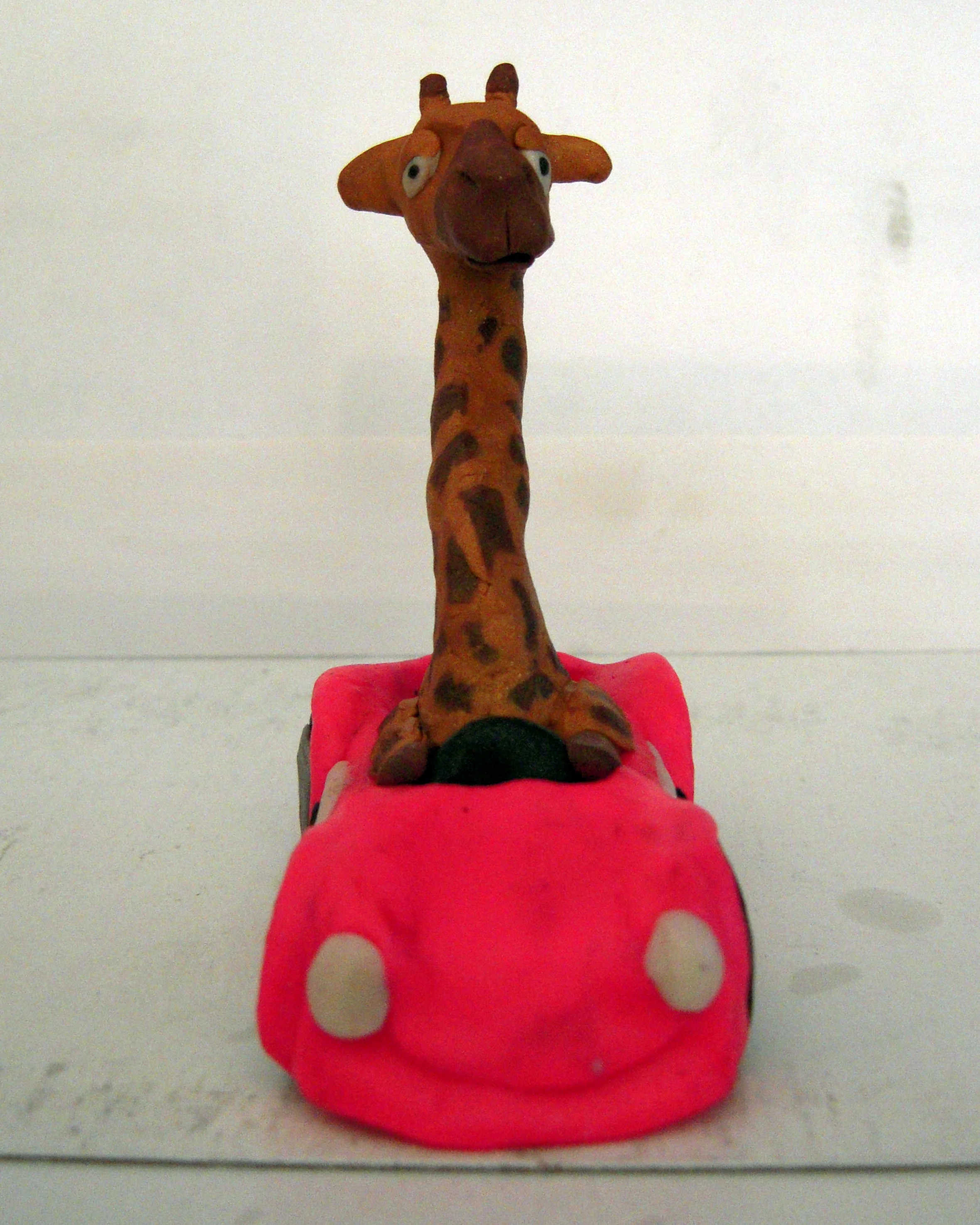 Giraffe in Racecar (front view)