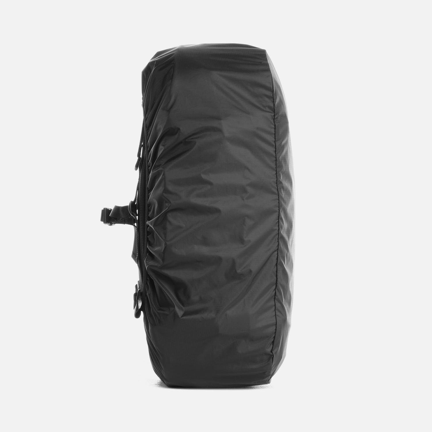 left my backpack out in the rain Rain Cover for Travel Pack - Black — Aer