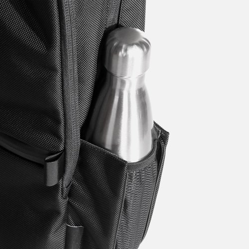 Expandable pocket for bottles or umbrellas.