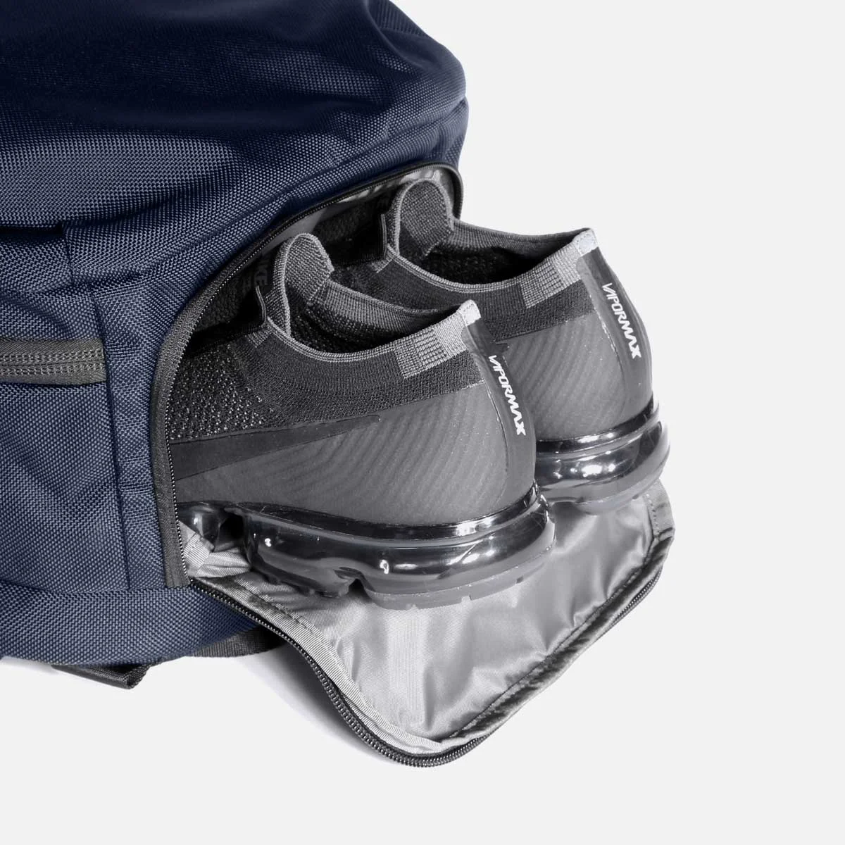 Separate compartment for shoes or dirty clothes.