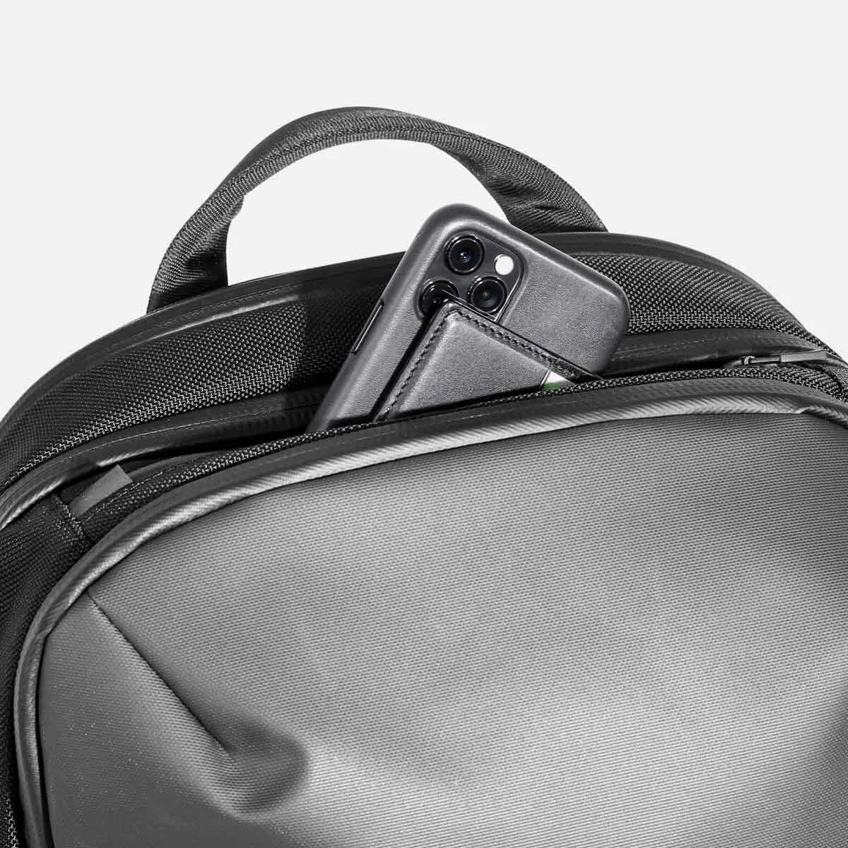 Quick-access top pocket with soft lining.