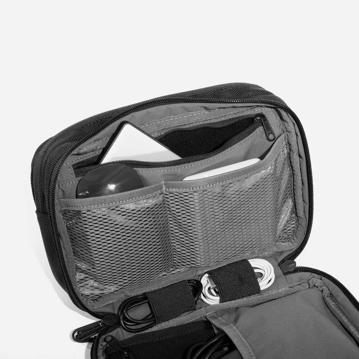 Interior device pocket with padded soft lining.