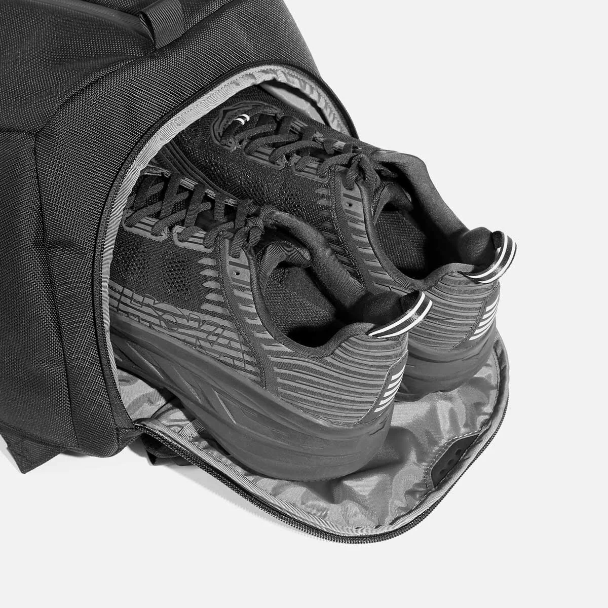 Ventilated shoe pocket with stowaway design.