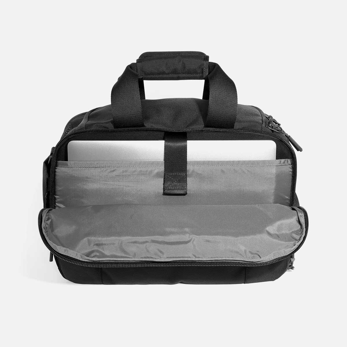 Laptop pocket with soft lining (fits up to 16" laptop).