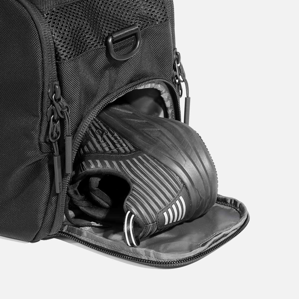 Ventilated shoe compartment with stowaway design.