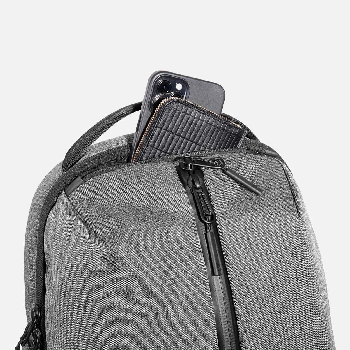 Quick-access top pocket with soft lining.