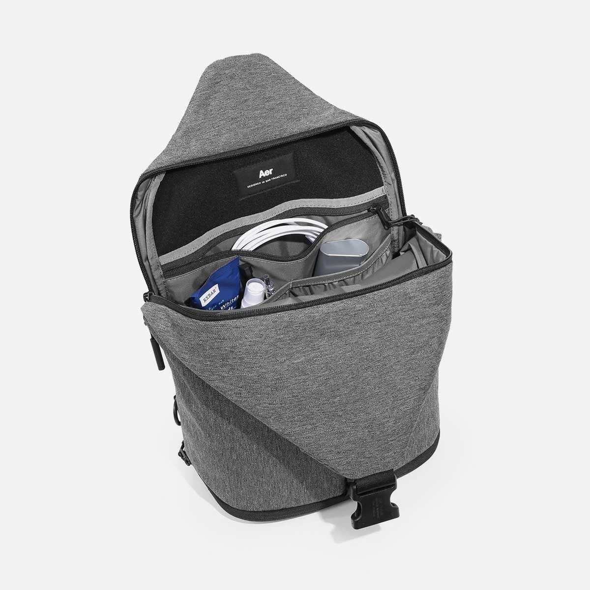 Suspended laptop pocket with soft lining (fits up to 13" laptop).