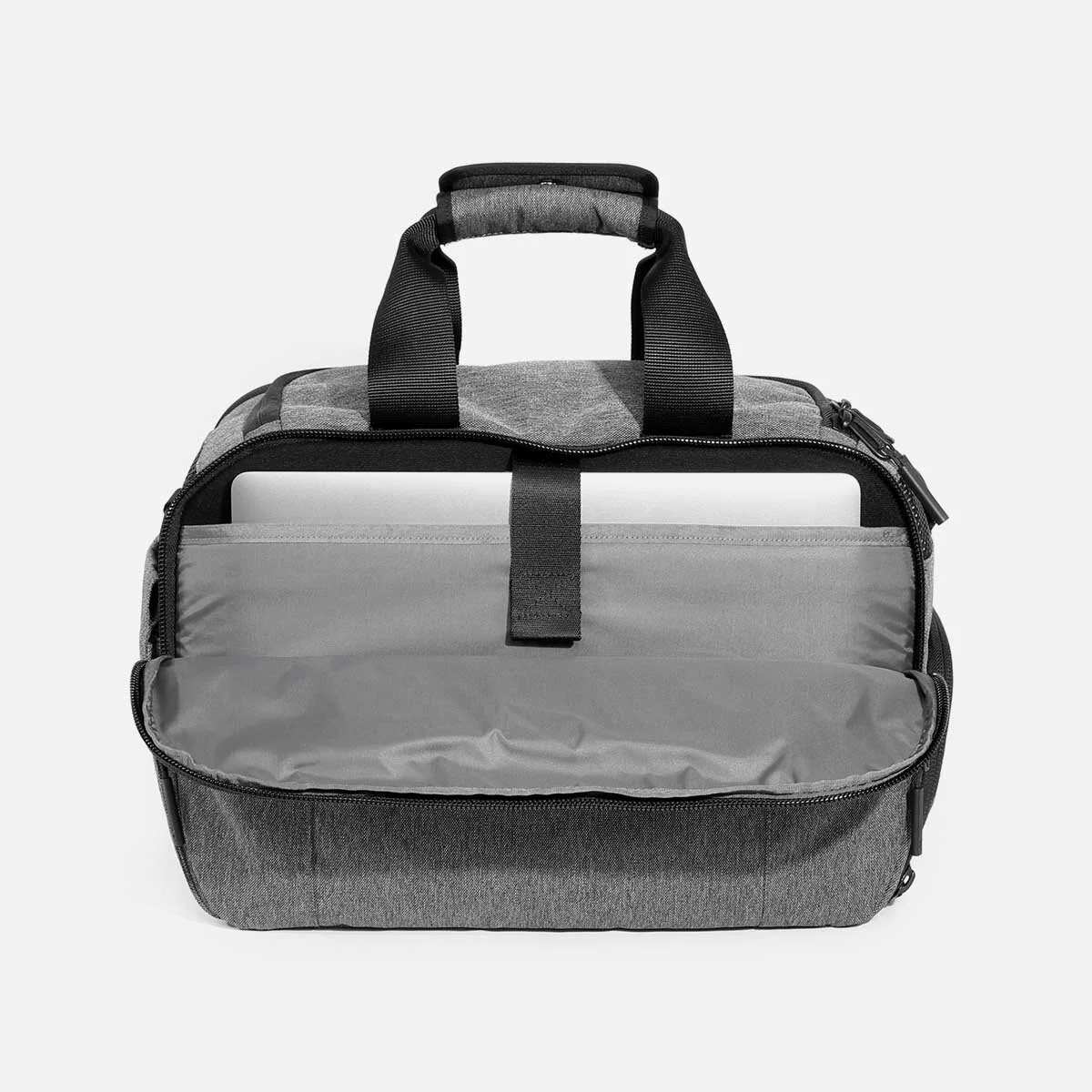 Laptop pocket with soft lining (fits up to 16" laptop).