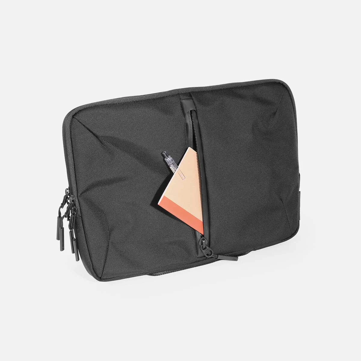 Quick-access pocket for cables or flat items.