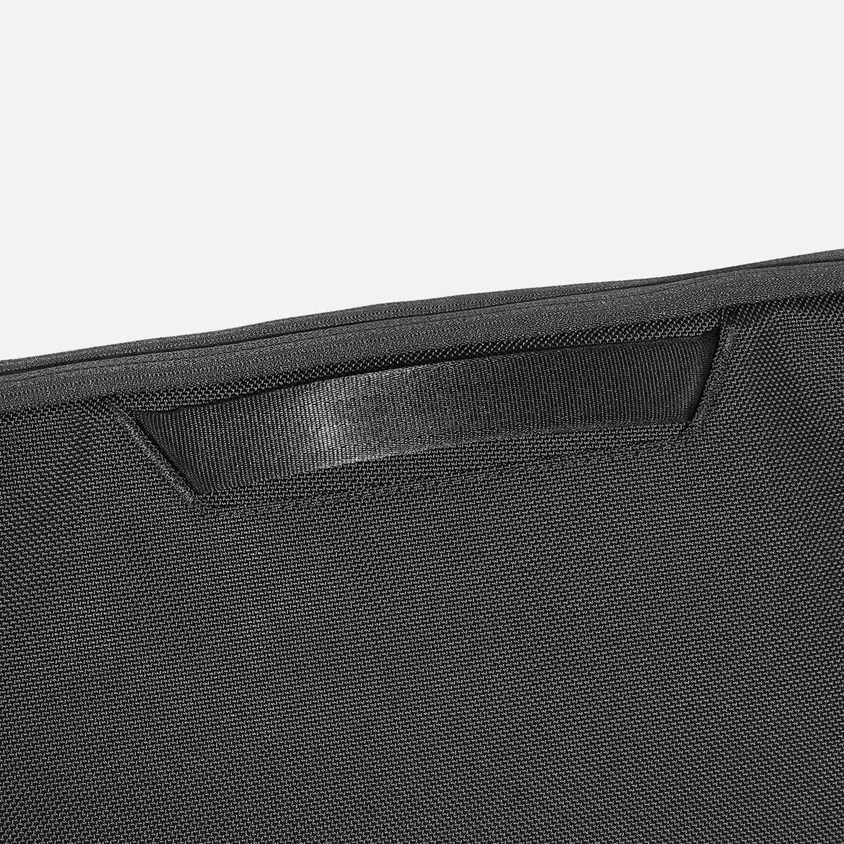 Padded, quick-grab top handle.